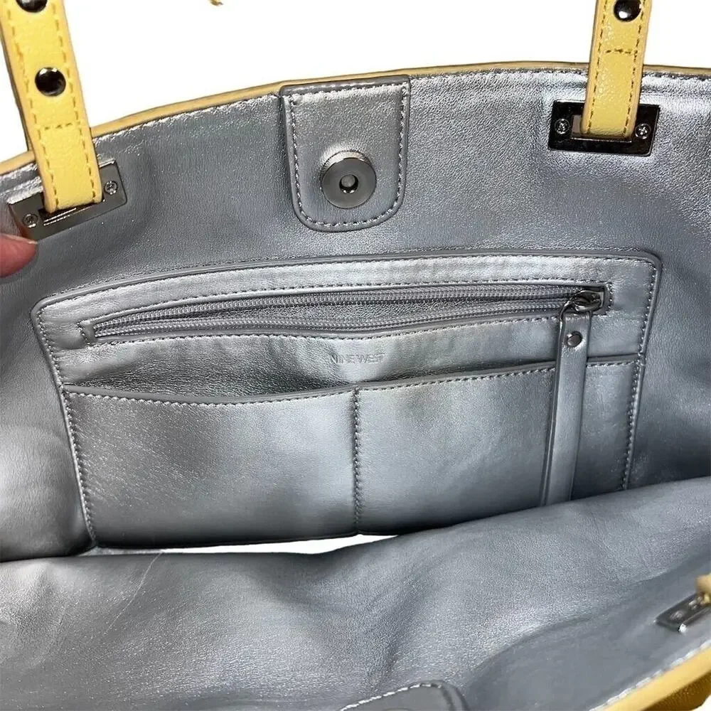 Nine West Ava Faux Leather Tote Bag Purse Floral Laser Cut Design Yellow Silver